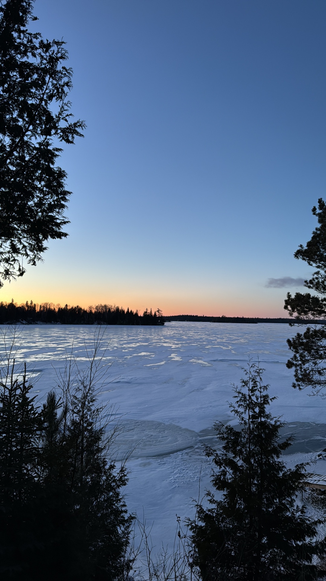 Frozen lake at dusk in Treaty #3 Territory